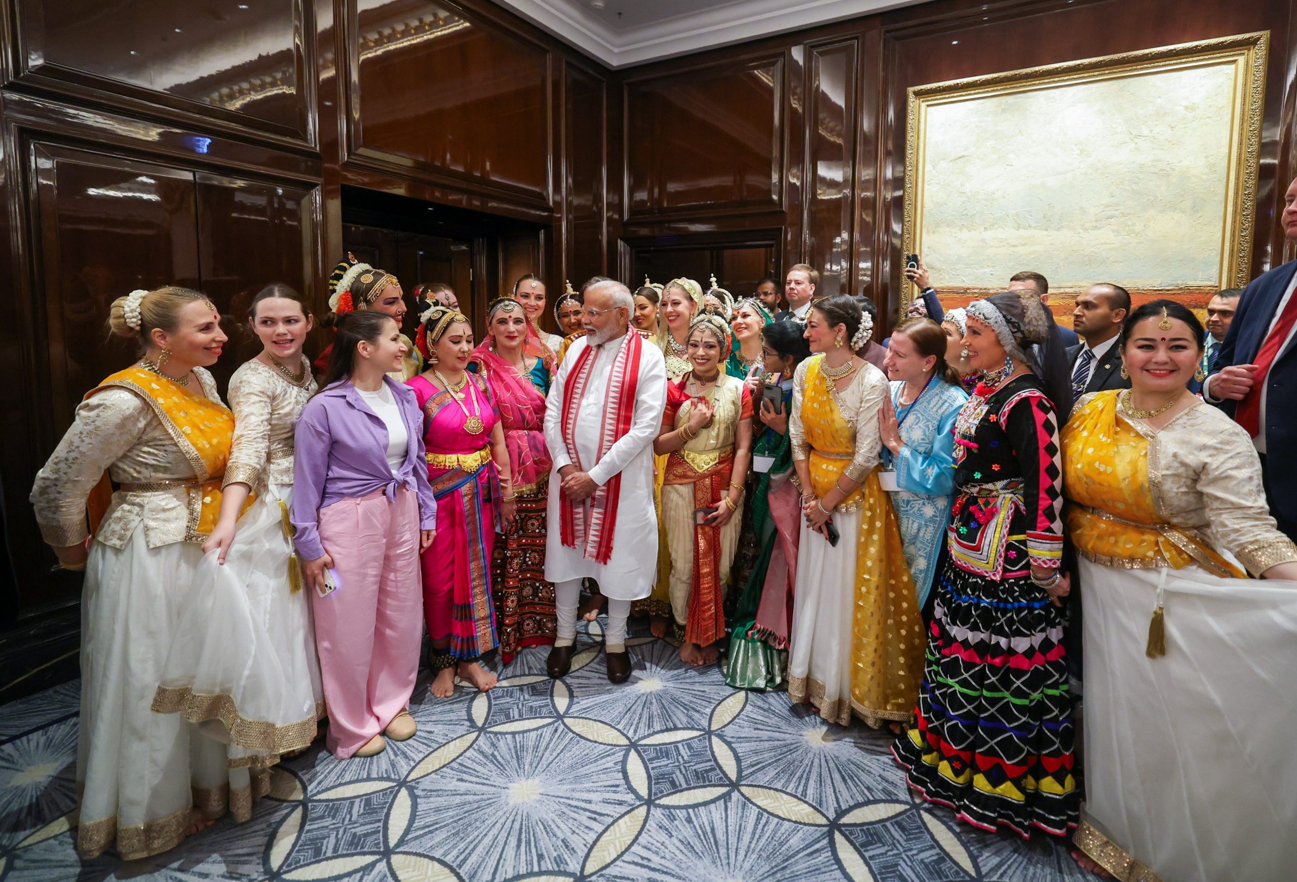 PM Modi interacts with artists of Russian Cultural Troupe.