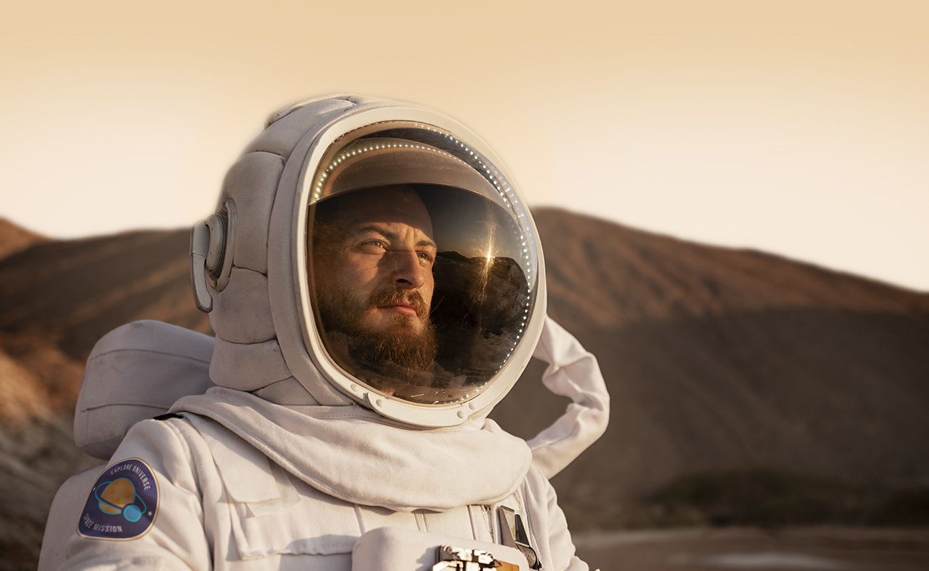 7male astronaut looking sun space mission another planet